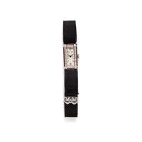 J.E. CALDWELL, PLATINUM, RUBY, AND DIAMOND WATCH