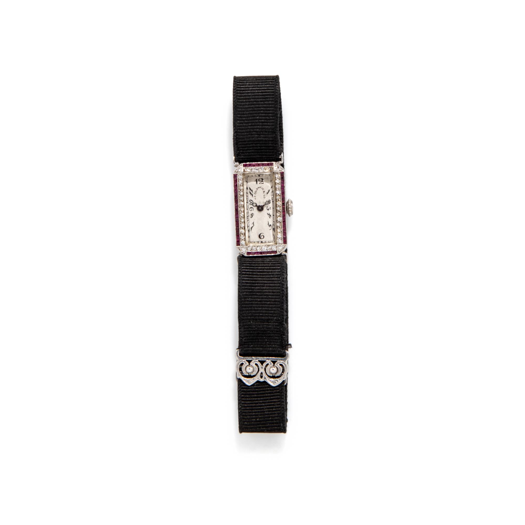 J.E. CALDWELL, PLATINUM, RUBY, AND DIAMOND WATCH