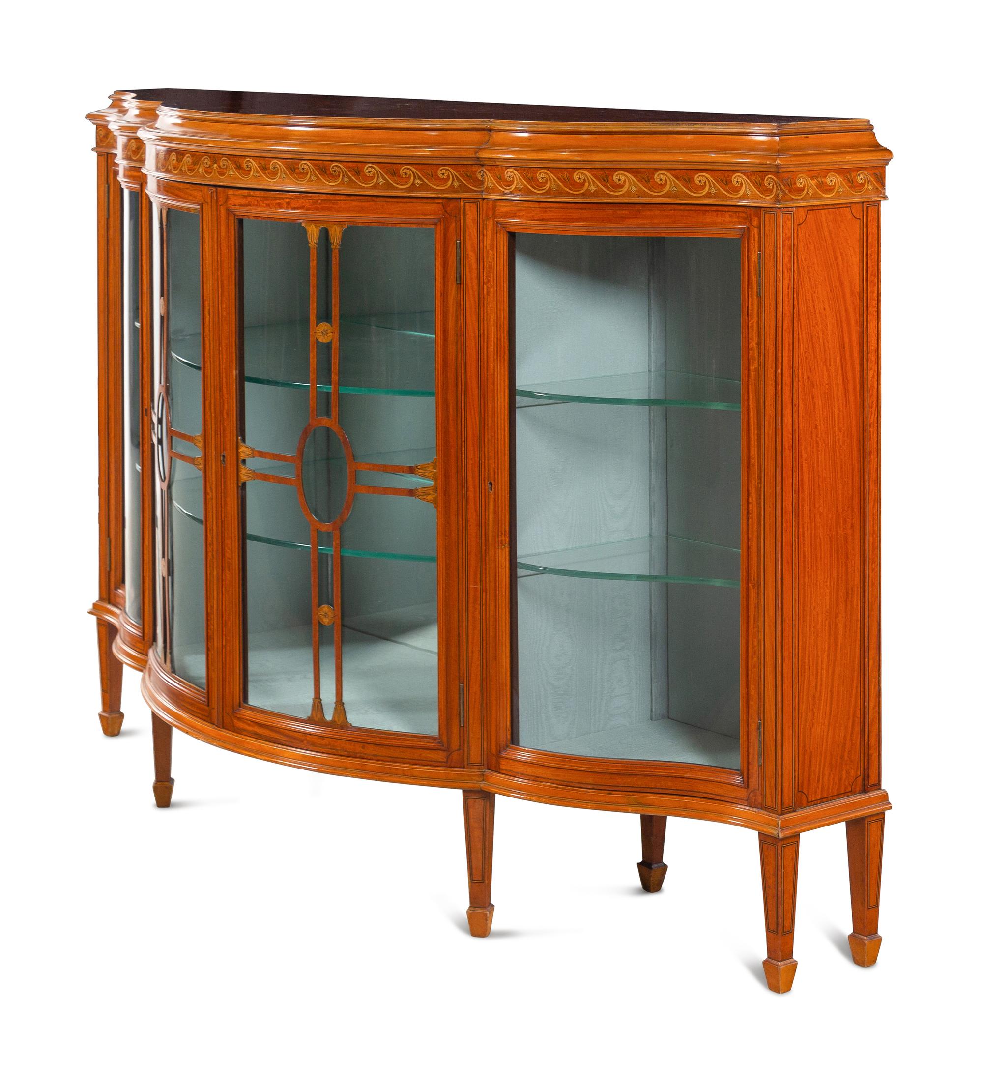 An Edwardian Satinwood and Marquetry Serpentine-Front Cabinet