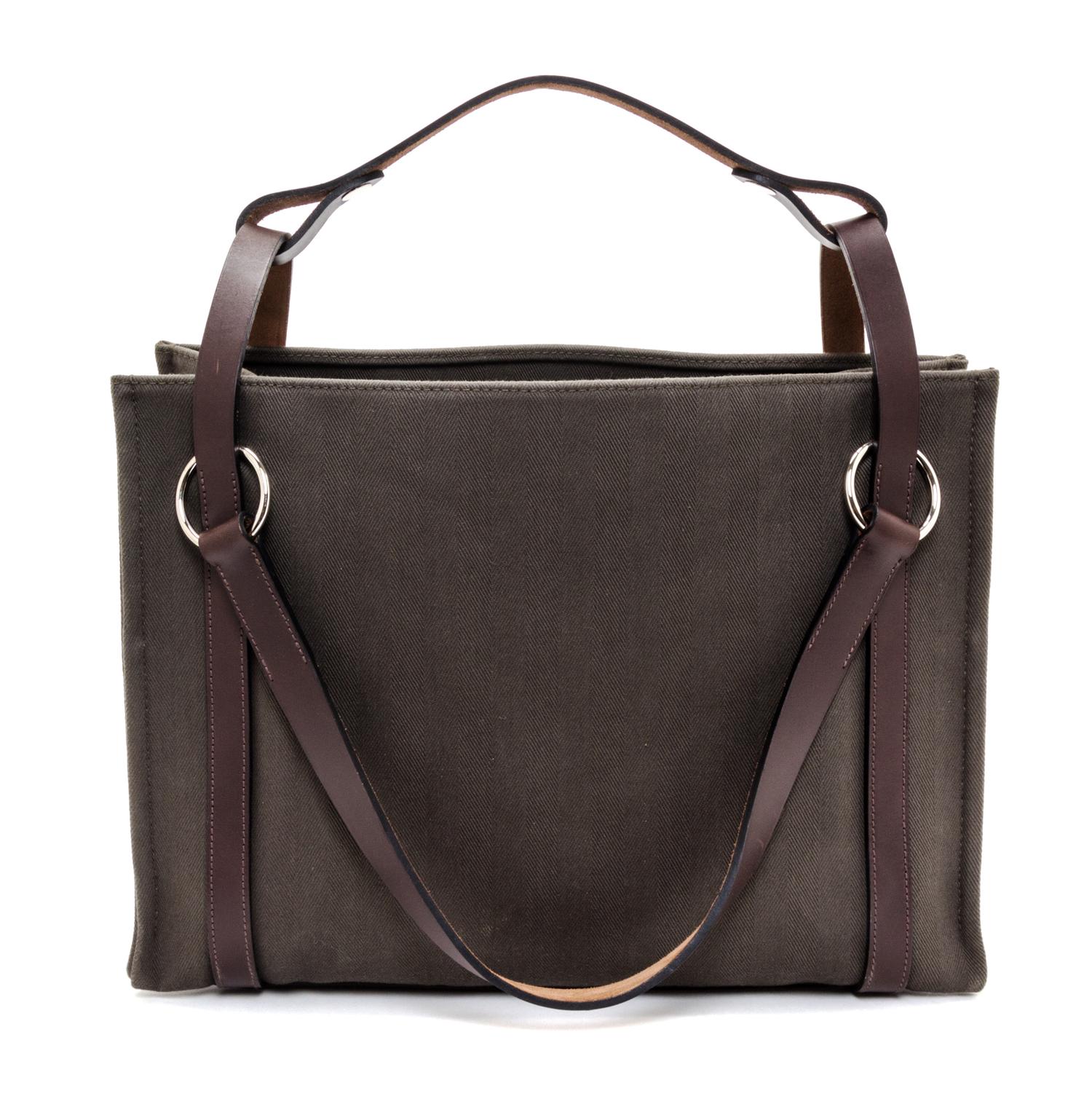 An Hermes Vert de Gris Canvas and Ebene Vache Cabalicol Tote, 15.5" x 11.5" x 6.5".