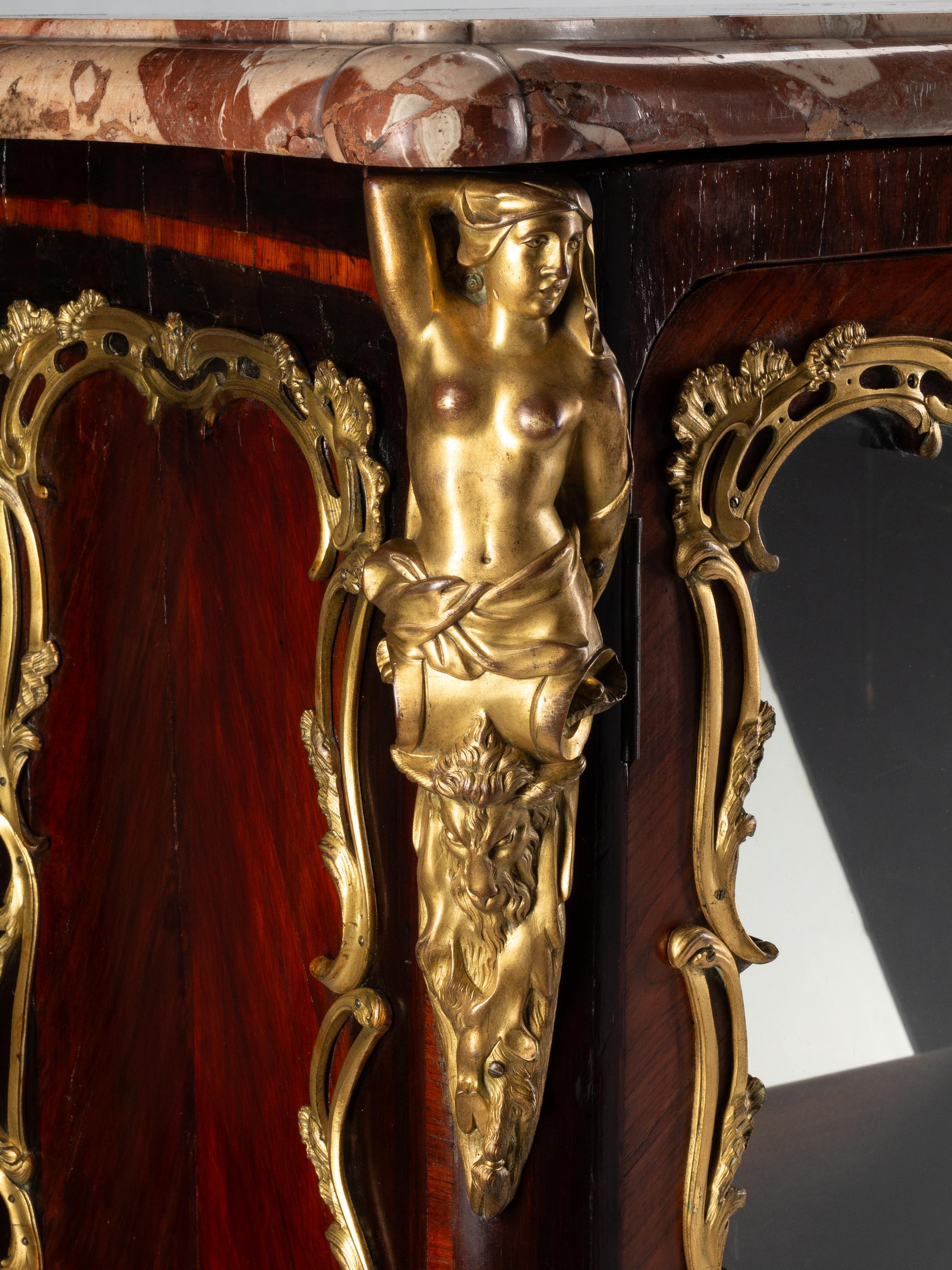 A Louis XV Style Gilt Bronze Mounted Kingwood Bookcase