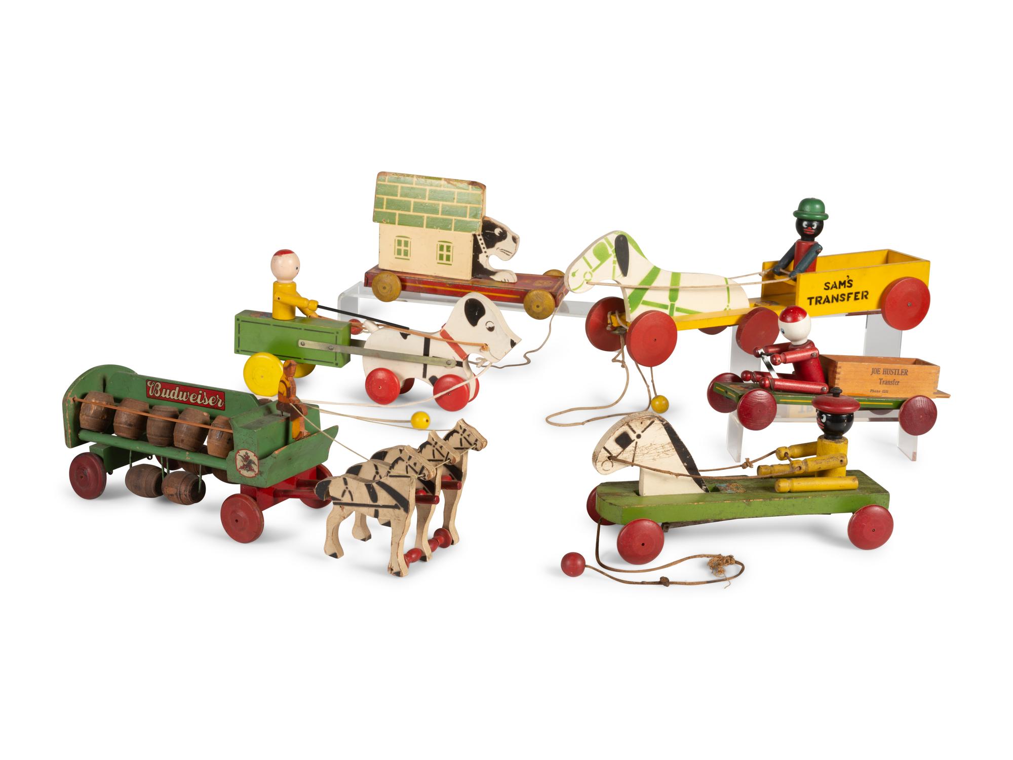 Six Carved Wood Figural Pull Toys