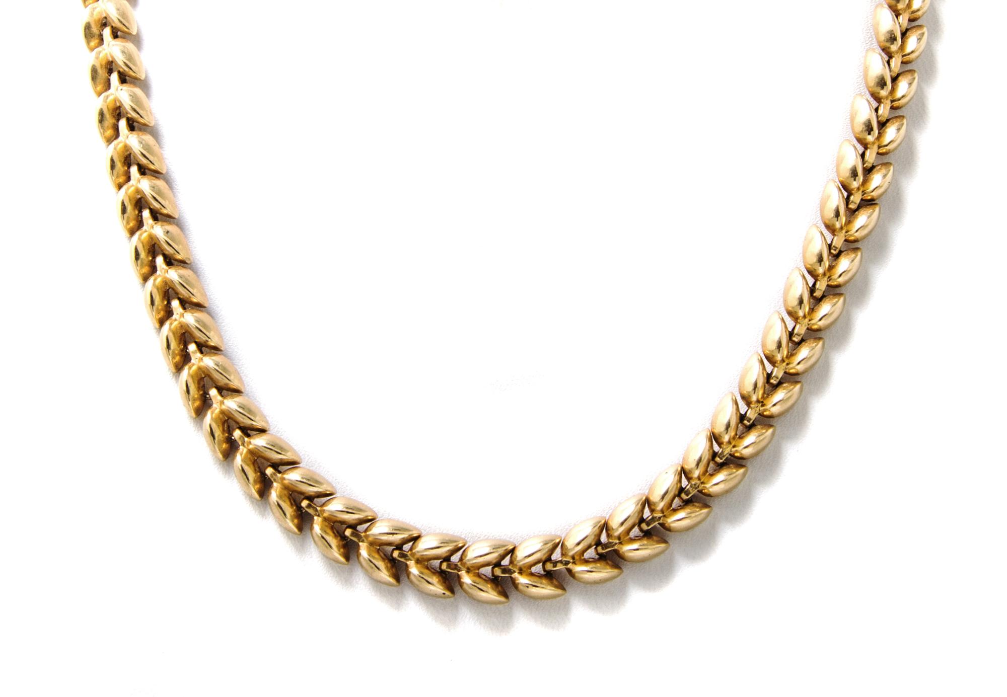 A 14 Karat Yellow Gold Leaf Motif Chain Necklace, 30.80 dwts.