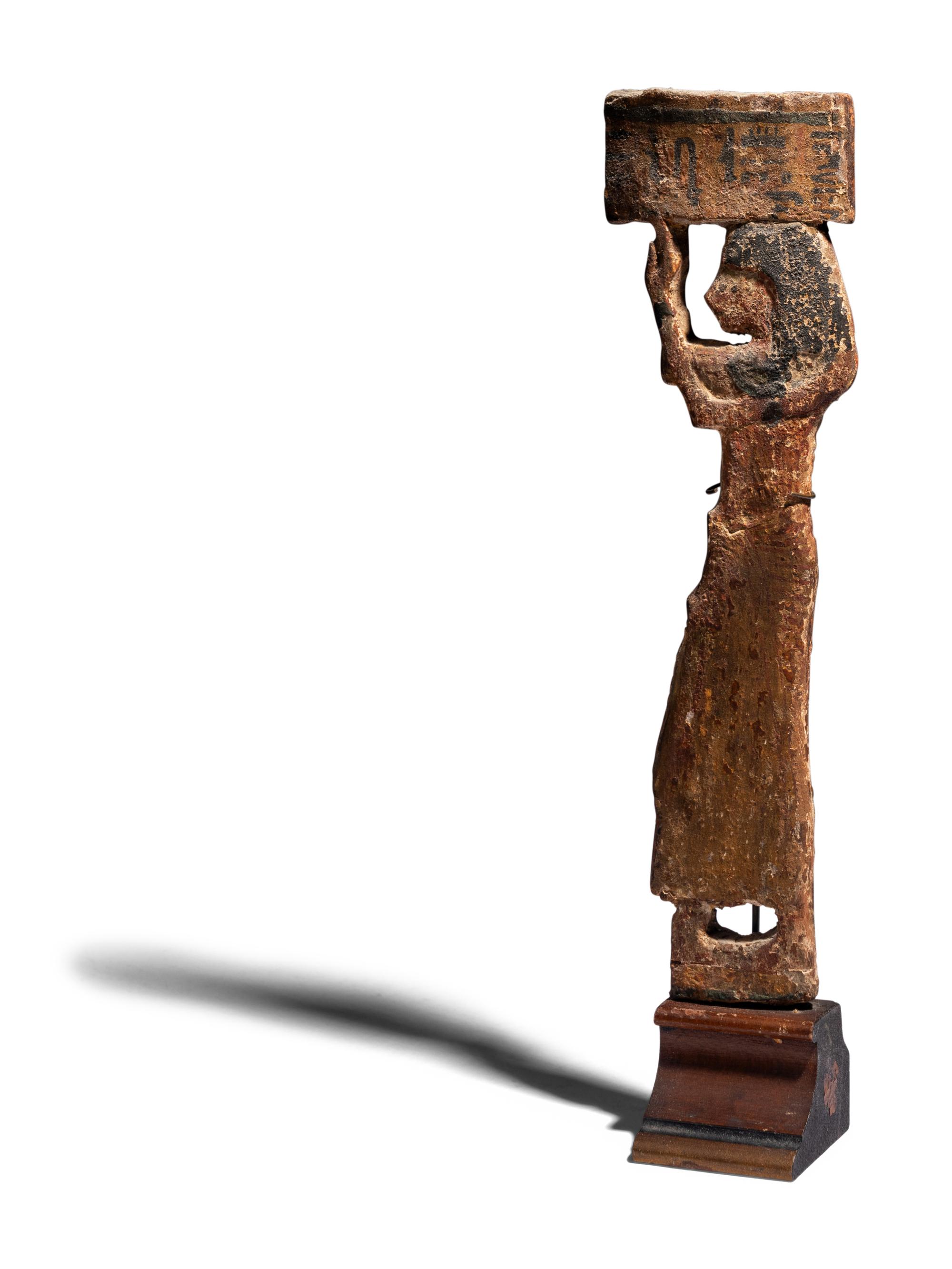 An Egyptian Wood Offering Bearer