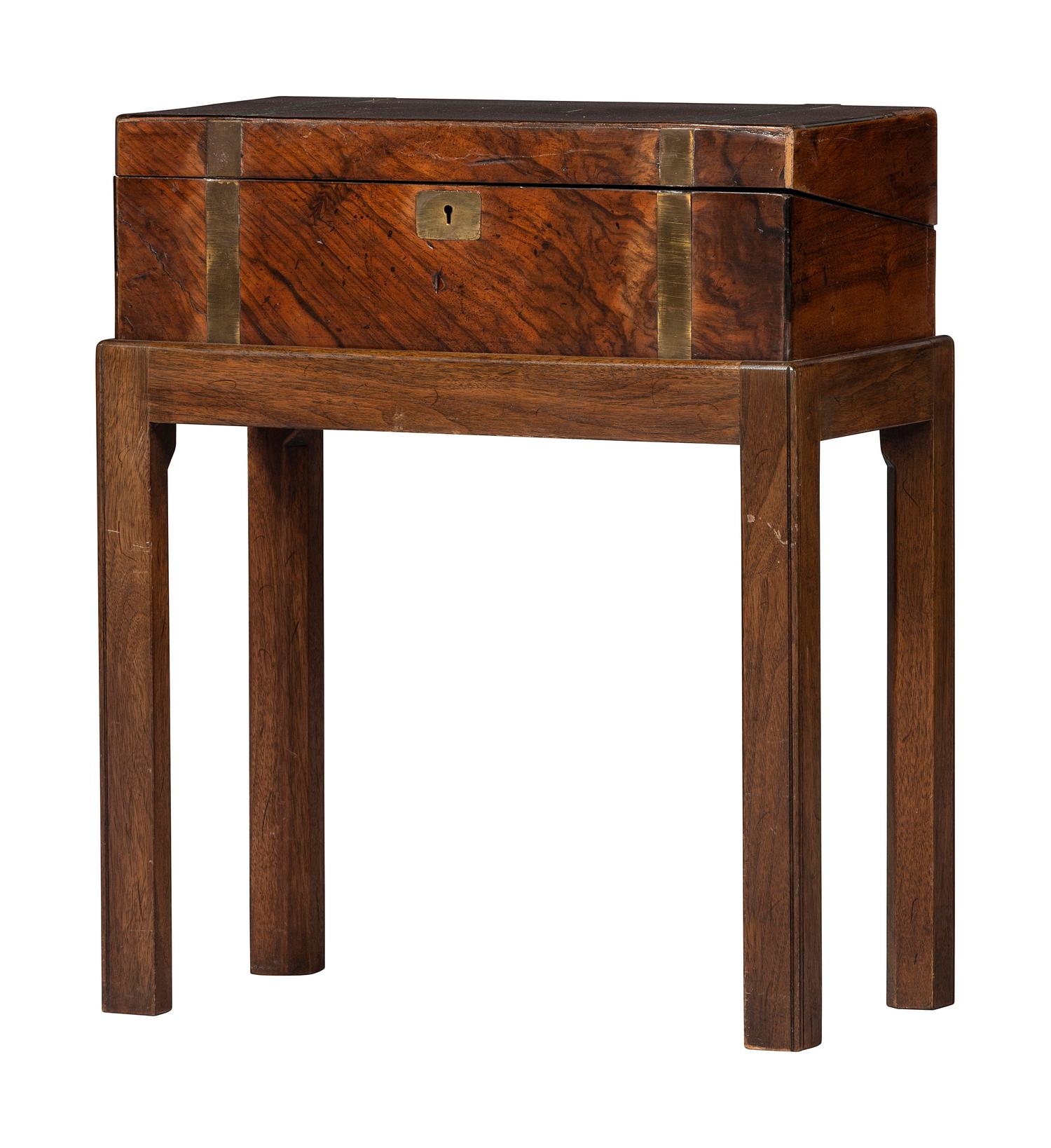 A Georgian Brass Mounted Mahogany Campaign Desk on Stand
