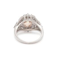 UNHEATED YELLOW-ORANGE SAPPHIRE AND DIAMOND RING