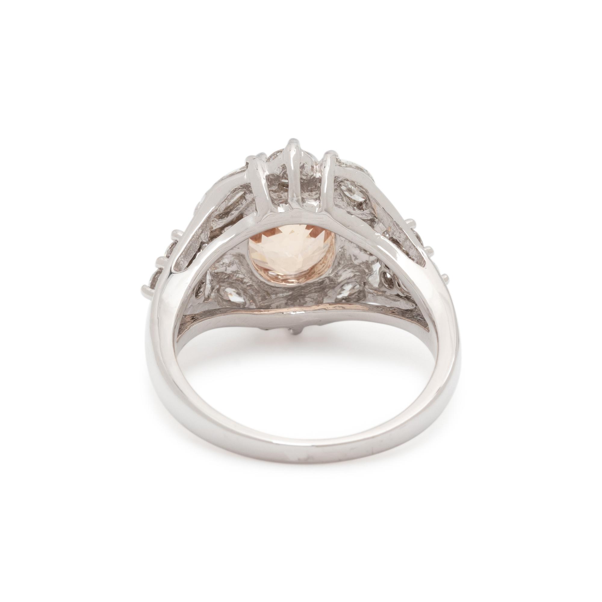 UNHEATED YELLOW-ORANGE SAPPHIRE AND DIAMOND RING