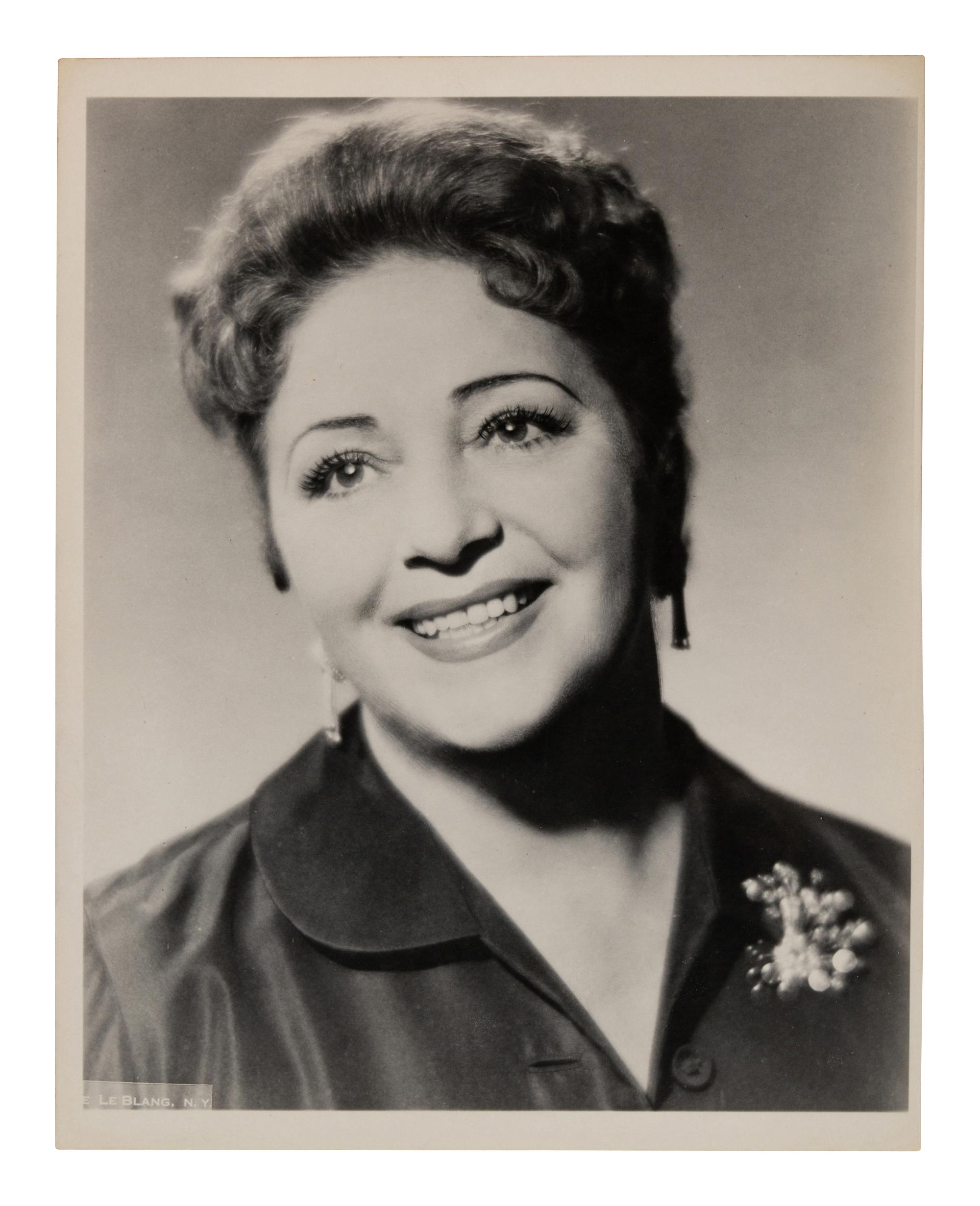 [20TH-CENTURY OPERA SINGERS]. A group of 6 photographs of opera singers from the 1940s, most signed, comprising images of: