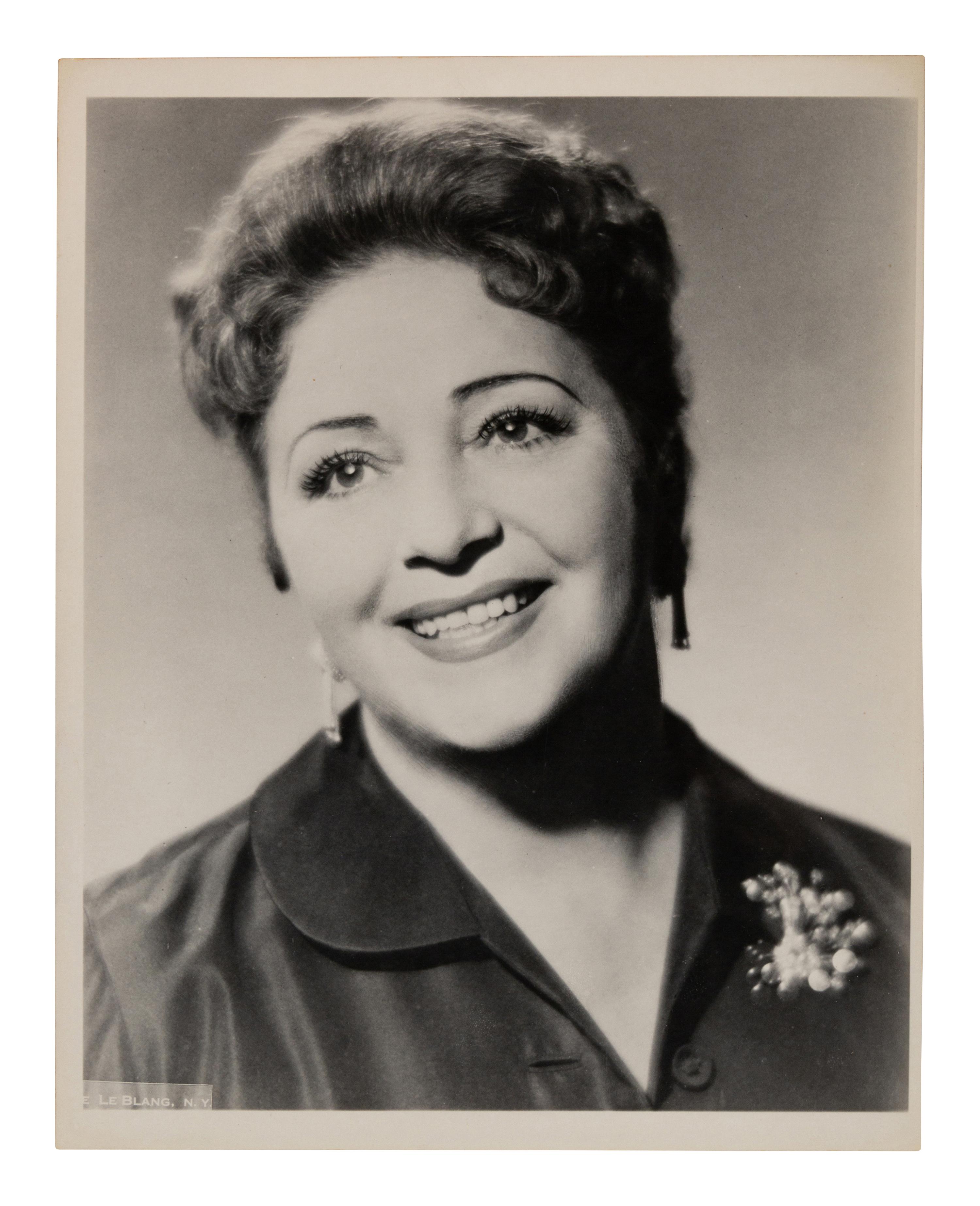 [20TH-CENTURY OPERA SINGERS]. A group of 6 photographs of opera singers from the 1940s, most signed, comprising images of:
