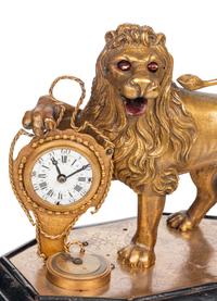 A German Gilt Brass Quarter-Striking Automaton Clock with Lion