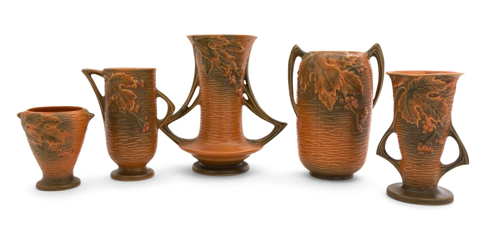 Five Roseville Bushberry Pottery Vases Height of tallest 8 1/8 inches.