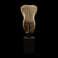 A Cycladic Marble Female Torso