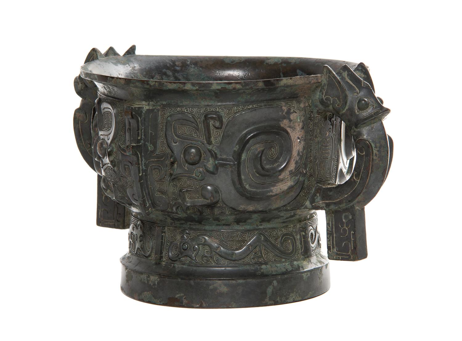 A Bronze Ritual Gui Vessel Width over handles 10 5/8 inches.