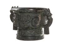 A Bronze Ritual Gui Vessel Width over handles 10 5/8 inches.