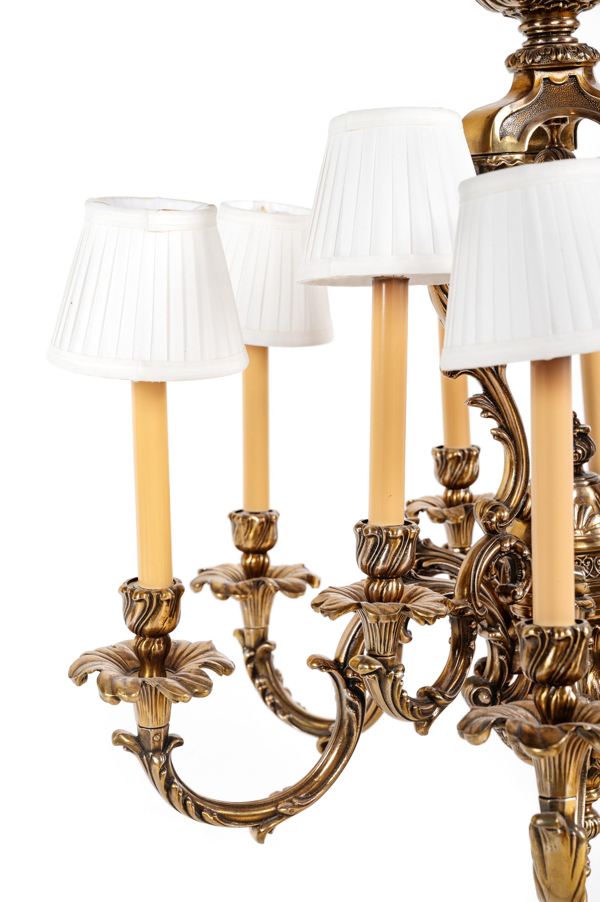 A Louis XV Style Gilt Metal Nine-Light Chandelier