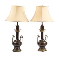 A Pair of French Gilt and Patinated Cast Metal Table Lamps