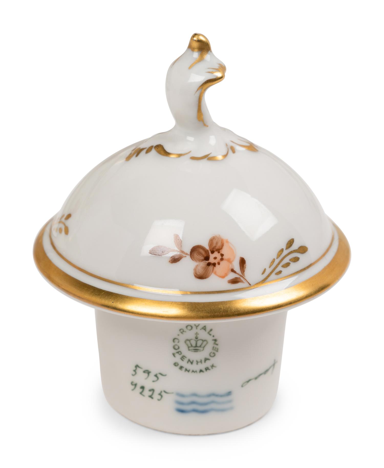 A Royal Copenhagen Golden Basket Porcelain Dinner Service
