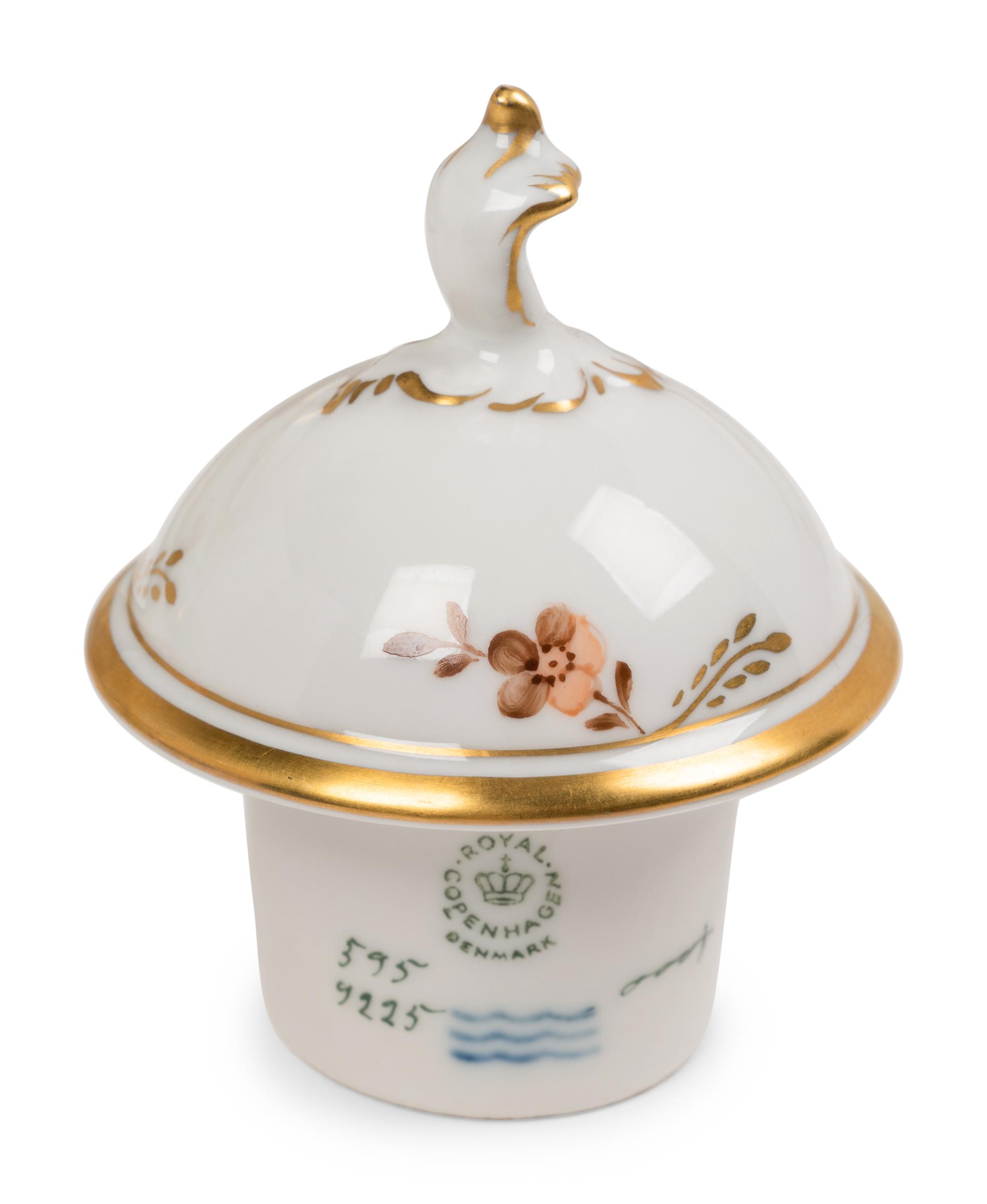 A Royal Copenhagen Golden Basket Porcelain Dinner Service