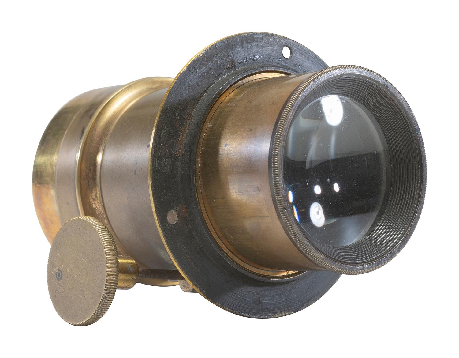 [CAMERAS]. Sixth plate daguerreotype lens with flange and brass cap.