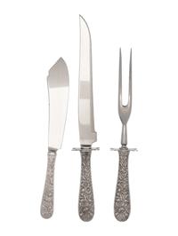 A Set of Three S. Kirk & Son Repoussé Silver Flatware Articles