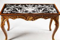 An Italian Baroque Style Parcel Gilt Shell and Marble-Veneered Table