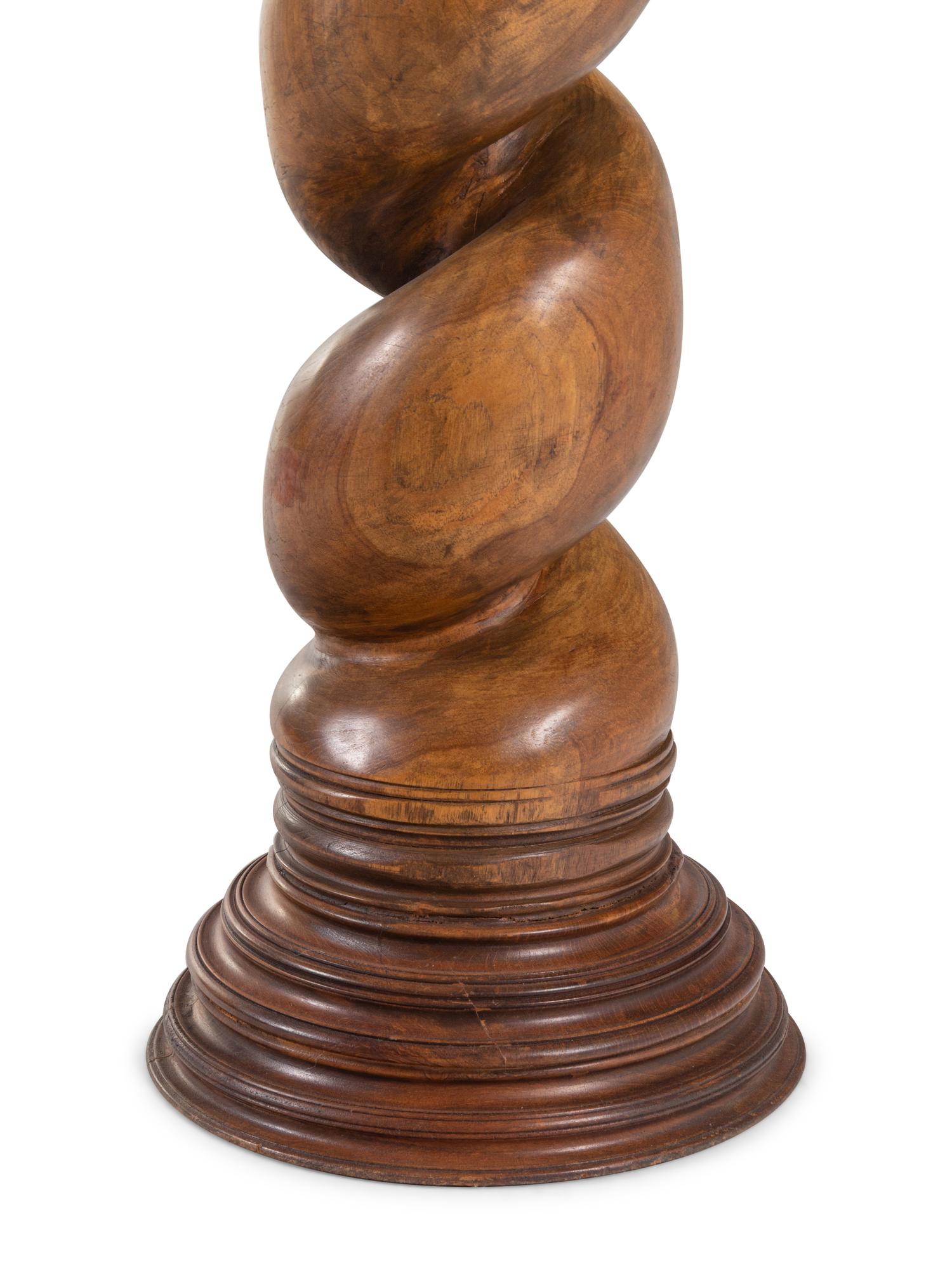 A Twist-Carved Hardwood Pedestal