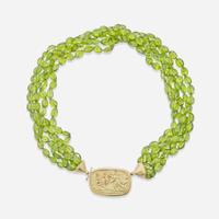 An 18K Yellow Gold and Peridot Torsade Necklace