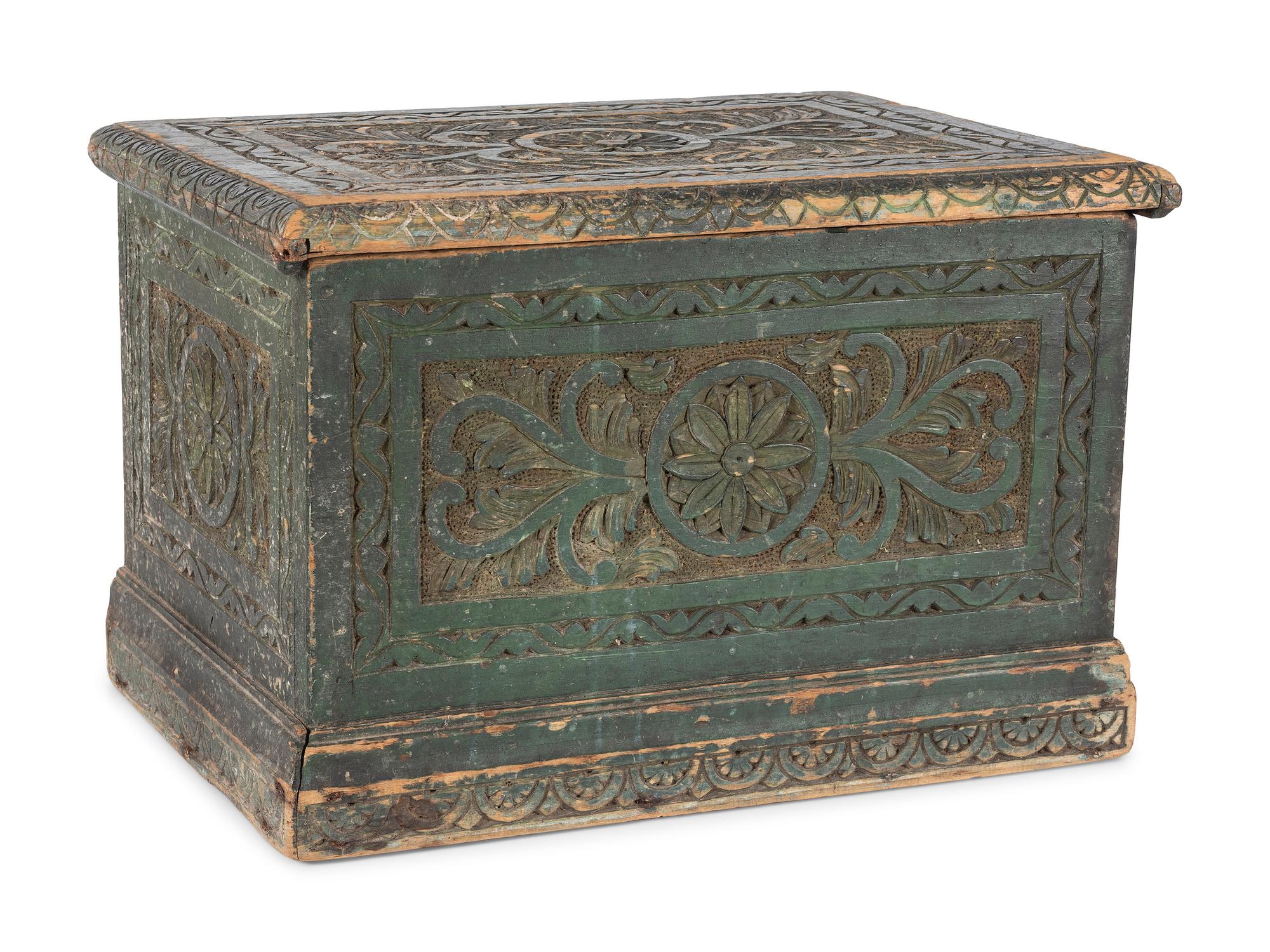 An Indonesian Carved and Painted Wood Trunk