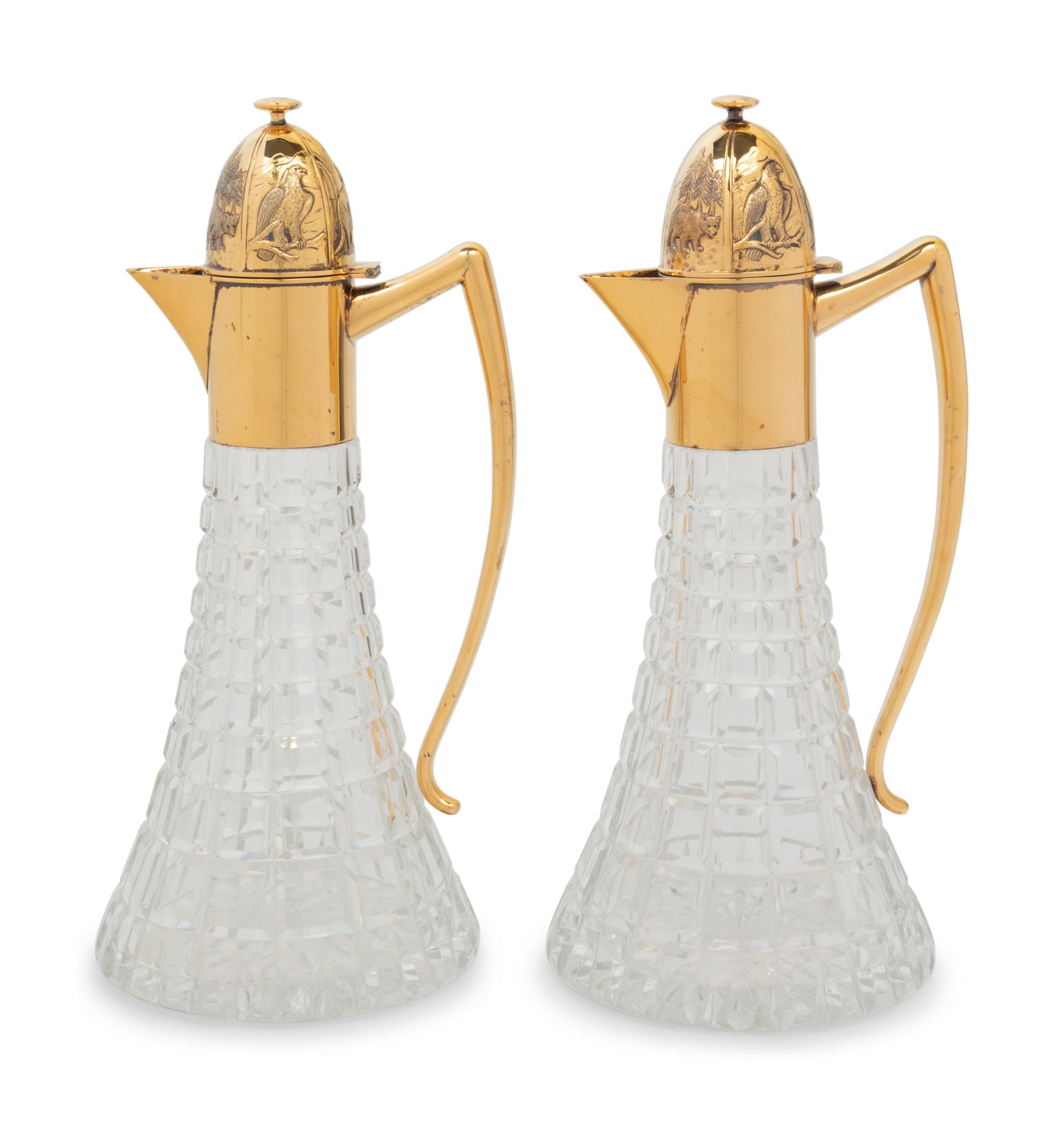 A Pair of English Silver-Gilt Mounted Cut Glass Decanters