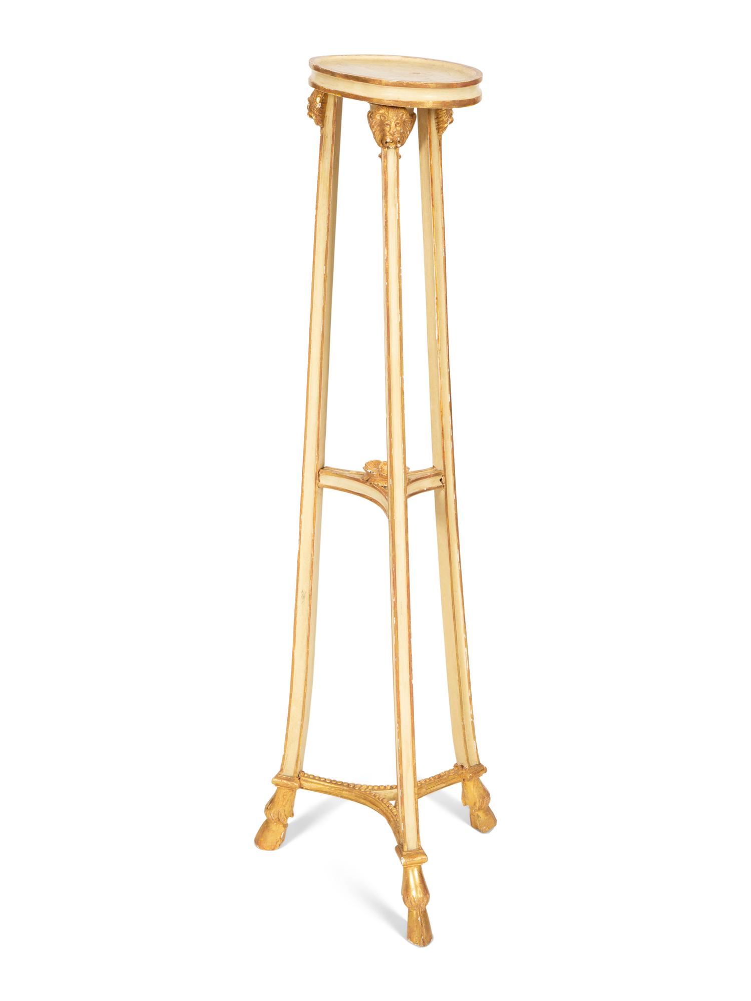 A George III Style Painted and Parcel Gilt Torchere Stand