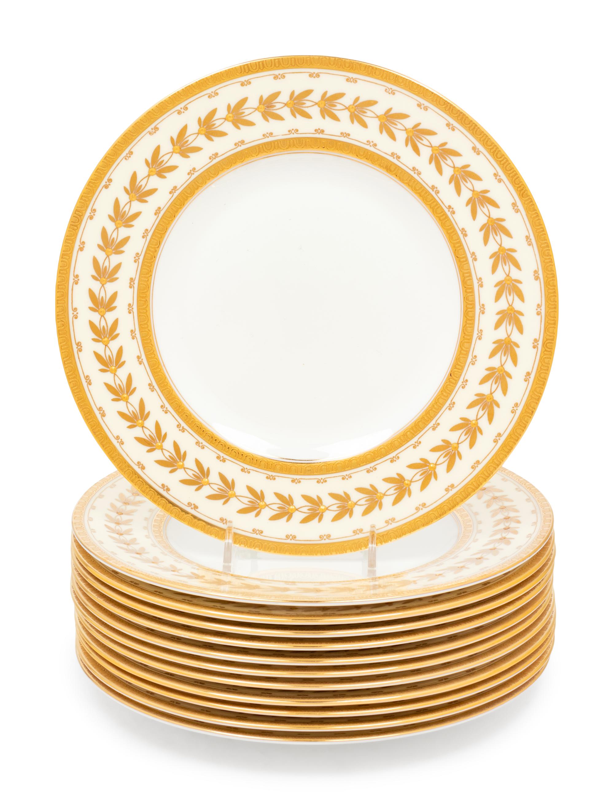 A Set of Twelve Minton Parcel Gilt Porcelain Salad Plates Retailed by Tiffany & Co.