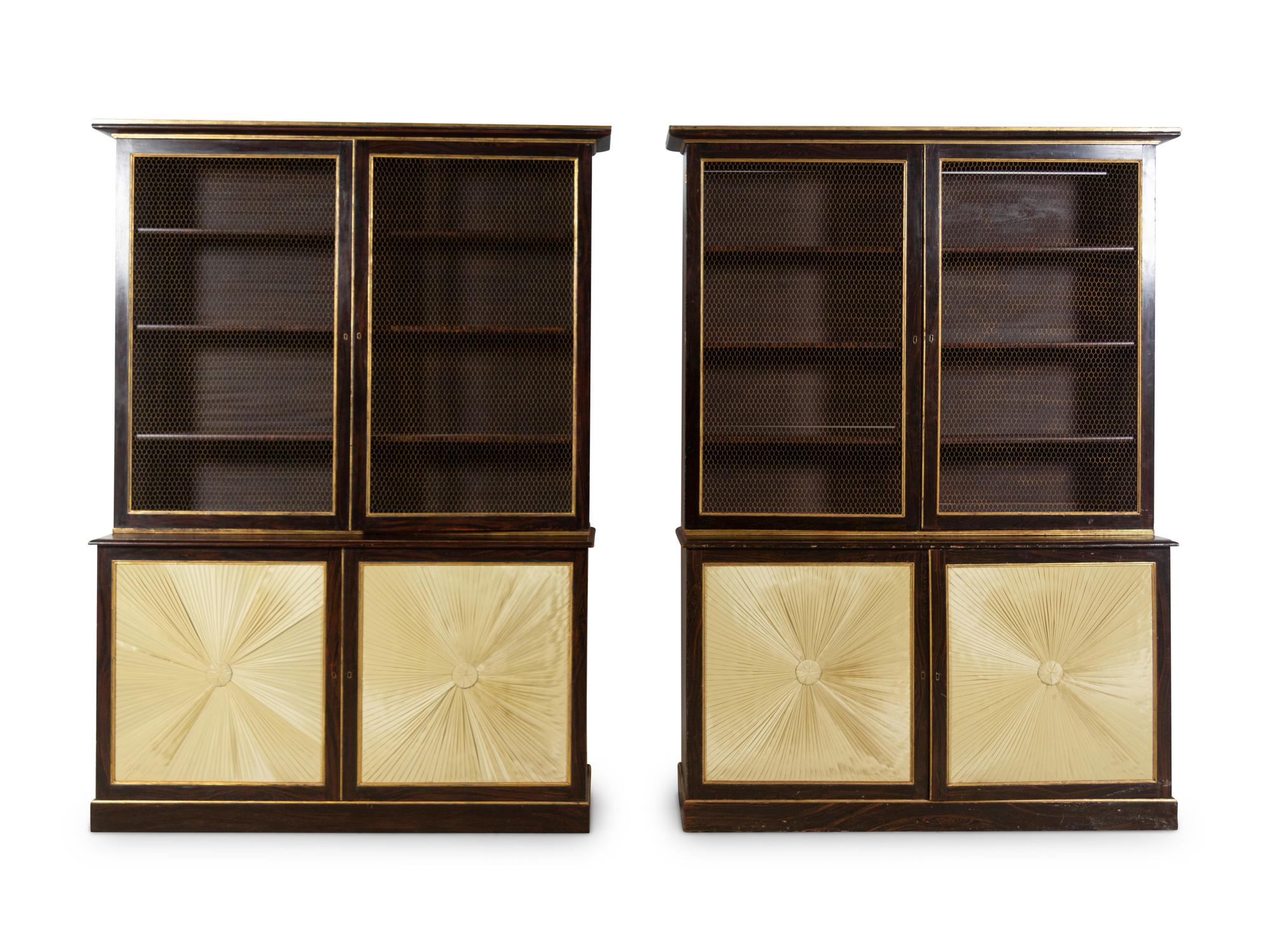 A Pair of Regency Style Grain Painted and Parcel Gilt Bookcases