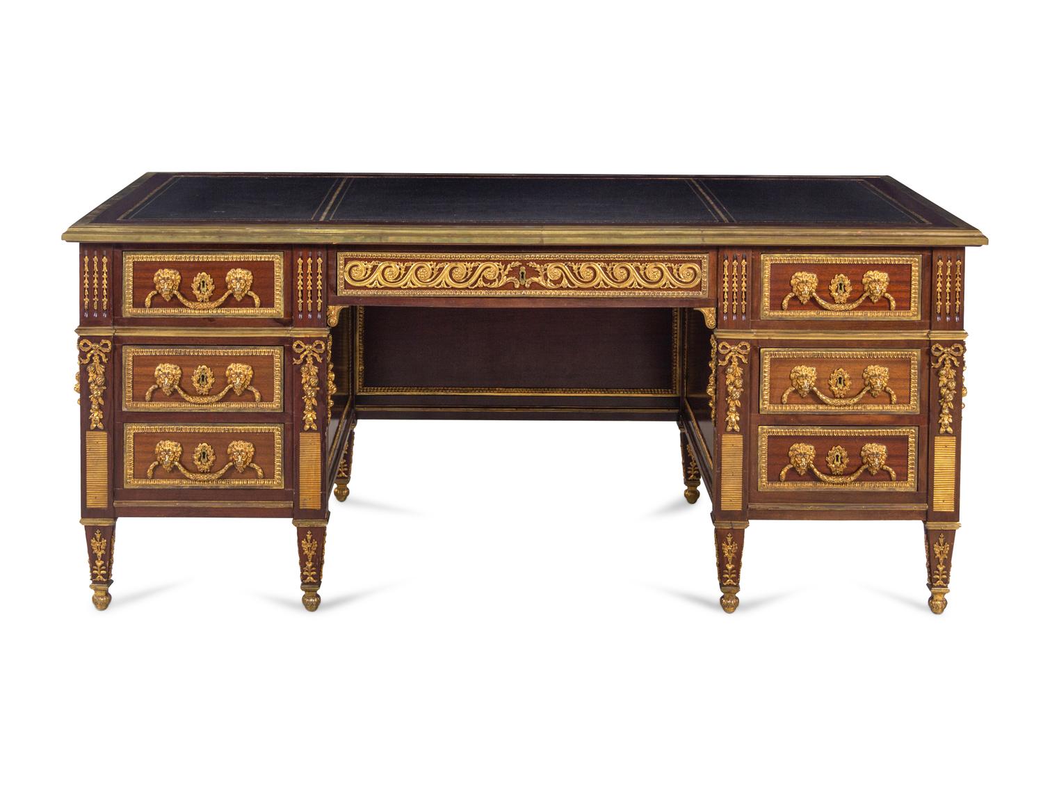 A Louis XV Style Gilt Bronze Mounted Mahogany Desk