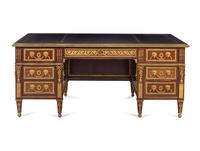 A Louis XV Style Gilt Bronze Mounted Mahogany Desk