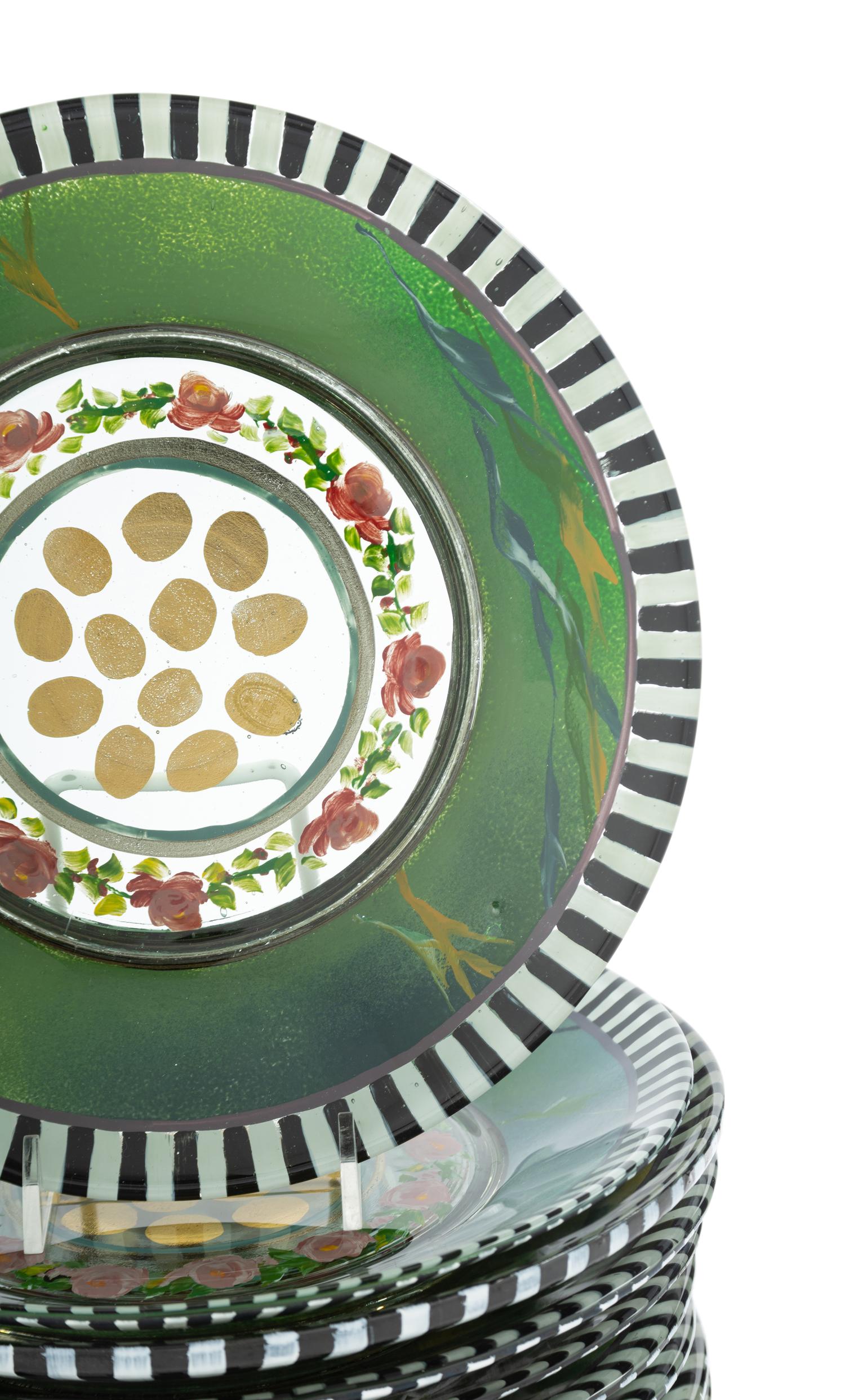 A Set of Twelve MacKenzie-Childs Heirloom Glass Dessert Plates