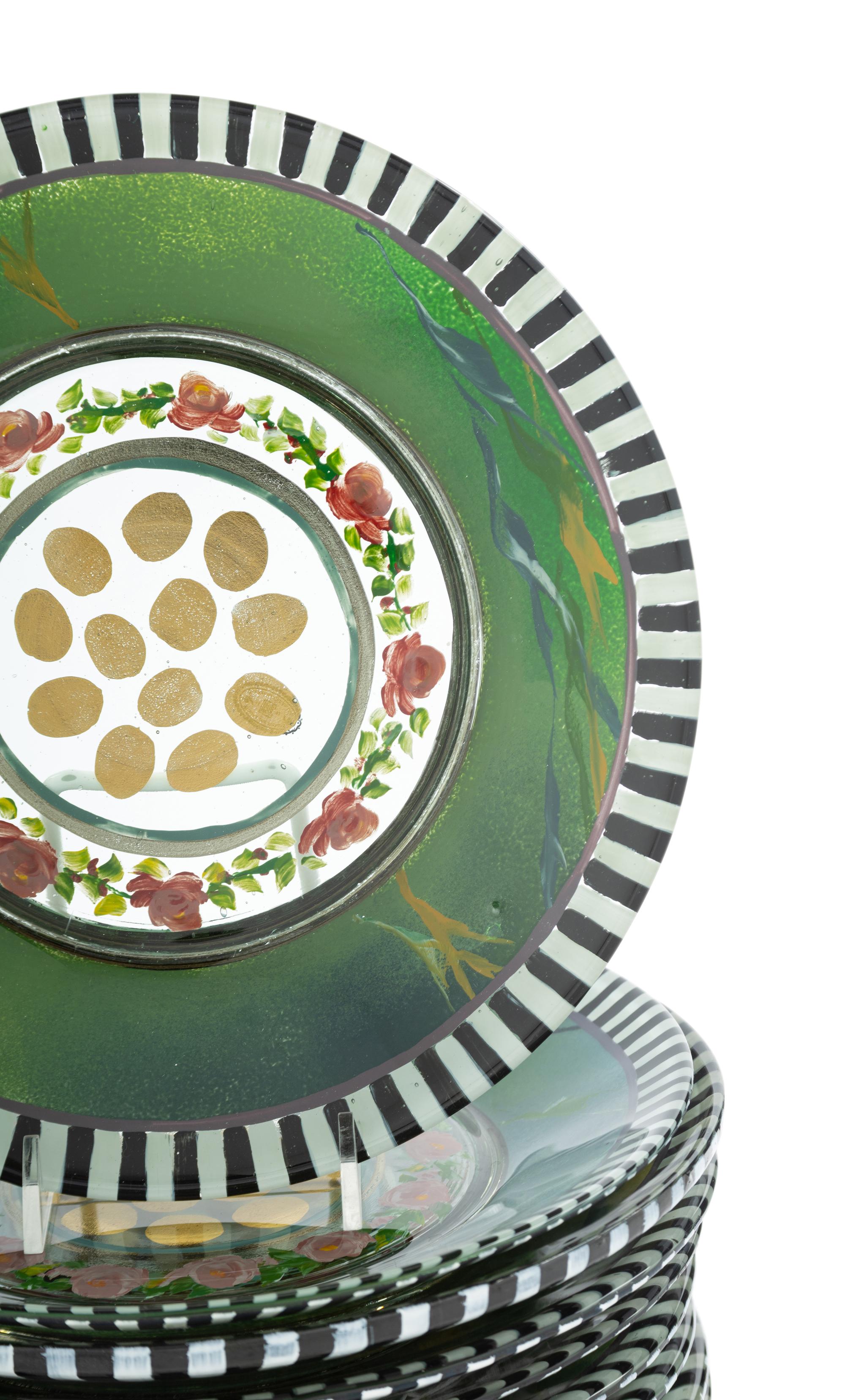 A Set of Twelve MacKenzie-Childs Heirloom Glass Dessert Plates