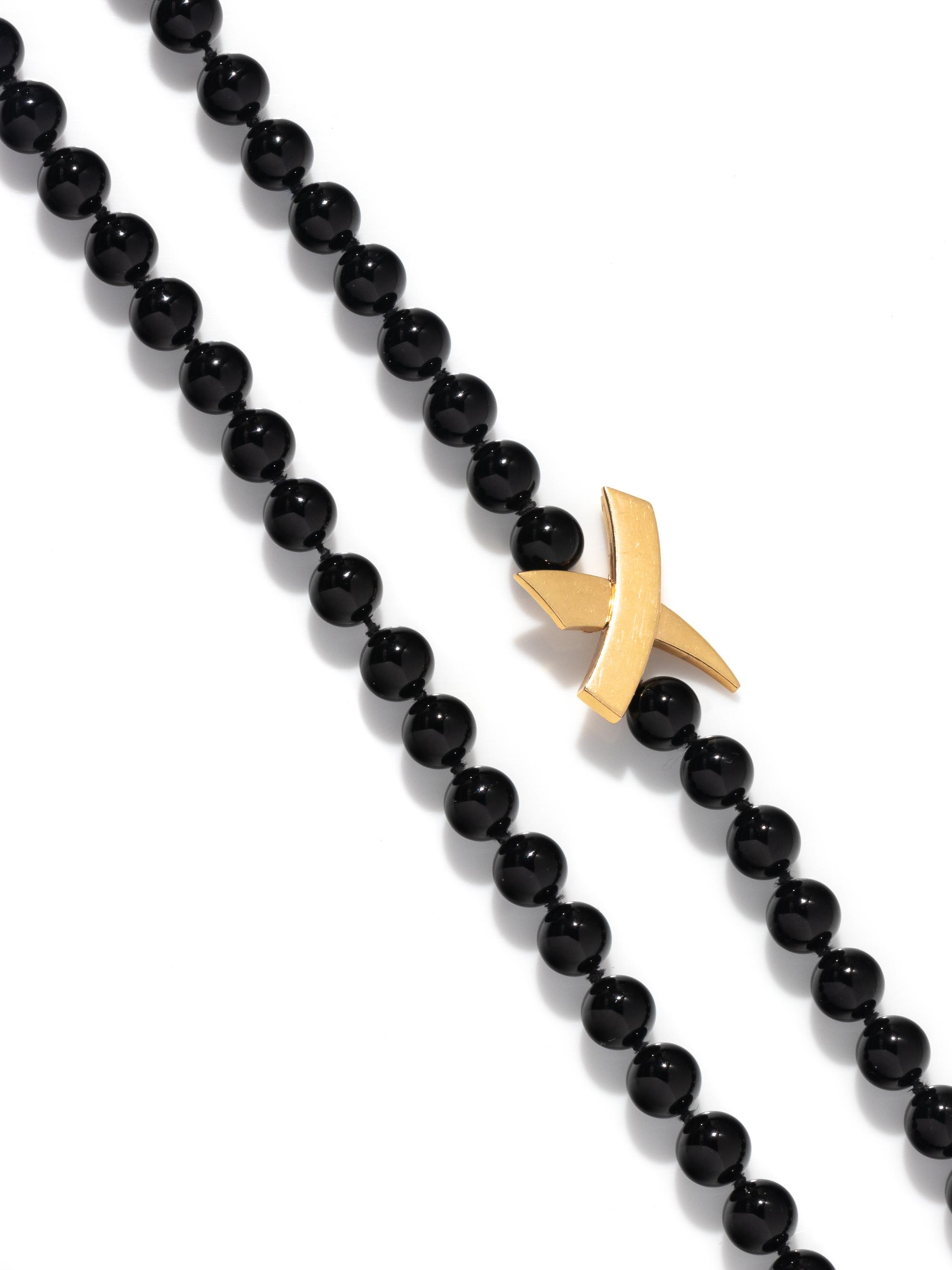 TIFFANY & CO., PALOMA PICASSO, FRENCH, YELLOW GOLD AND ONYX NECKLACE