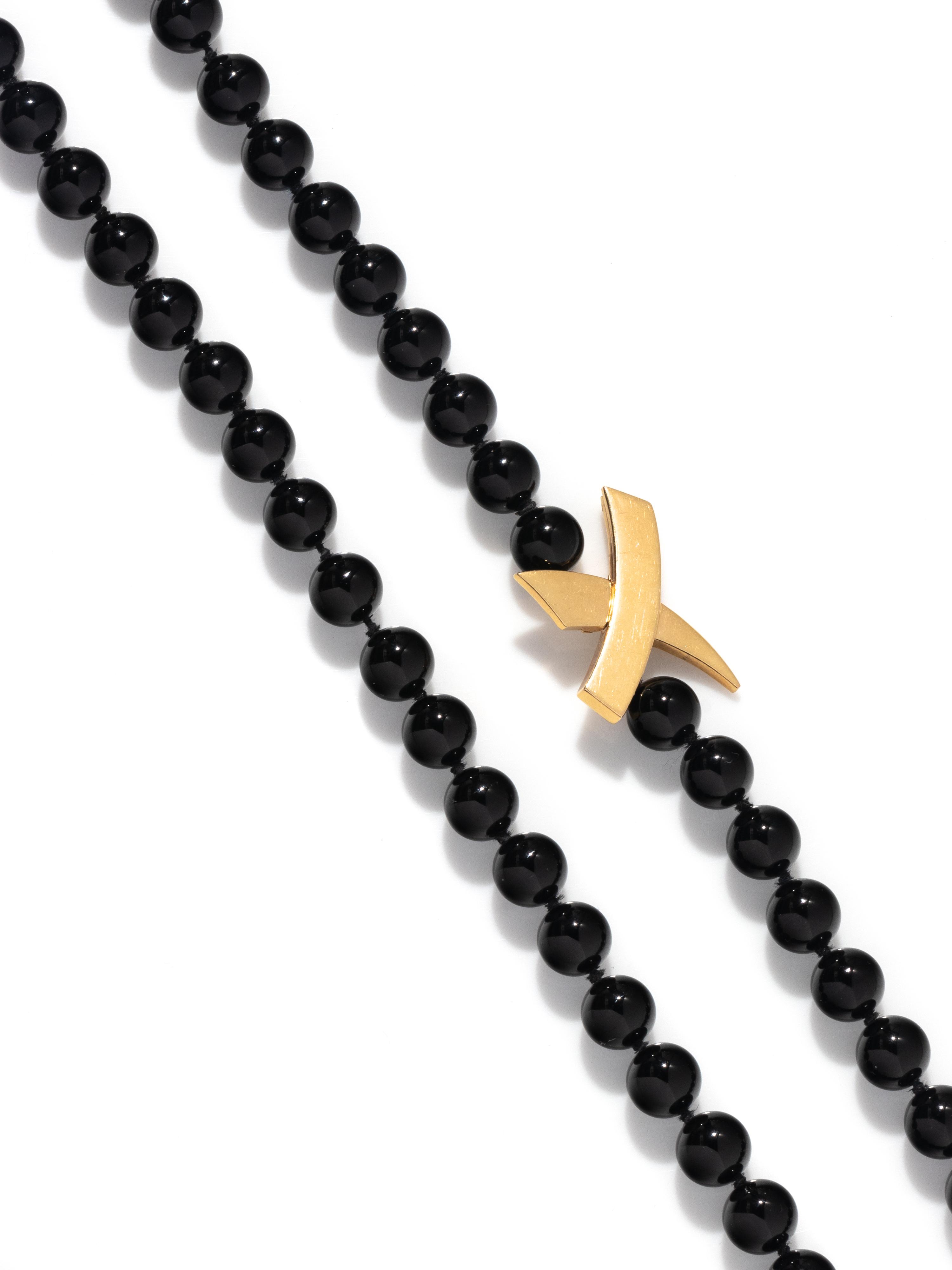 TIFFANY & CO., PALOMA PICASSO, FRENCH, YELLOW GOLD AND ONYX NECKLACE