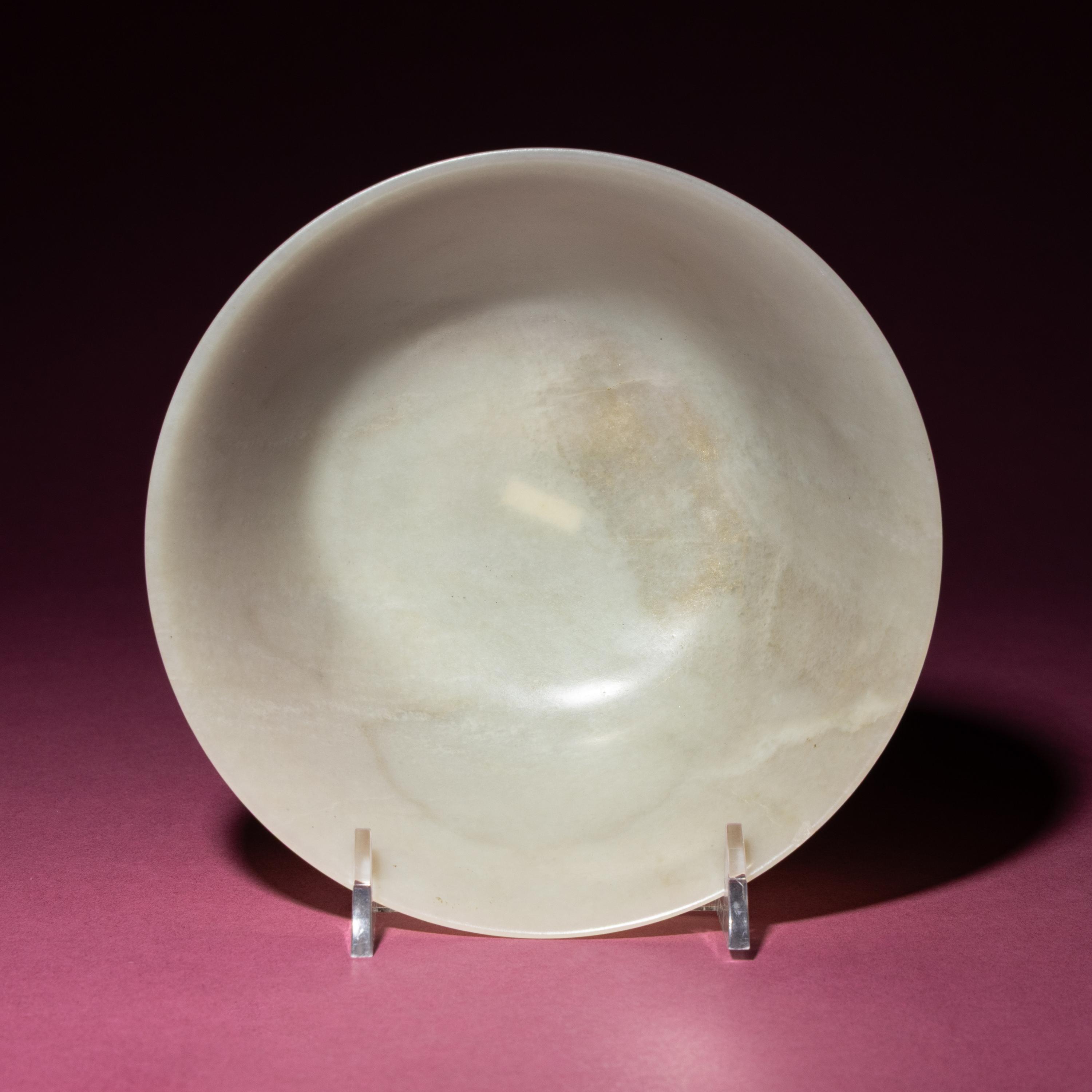 A Chinese Carved White Jade ‘Floral’ Bowl, 18th Century — 清中期 白玉刻花碗