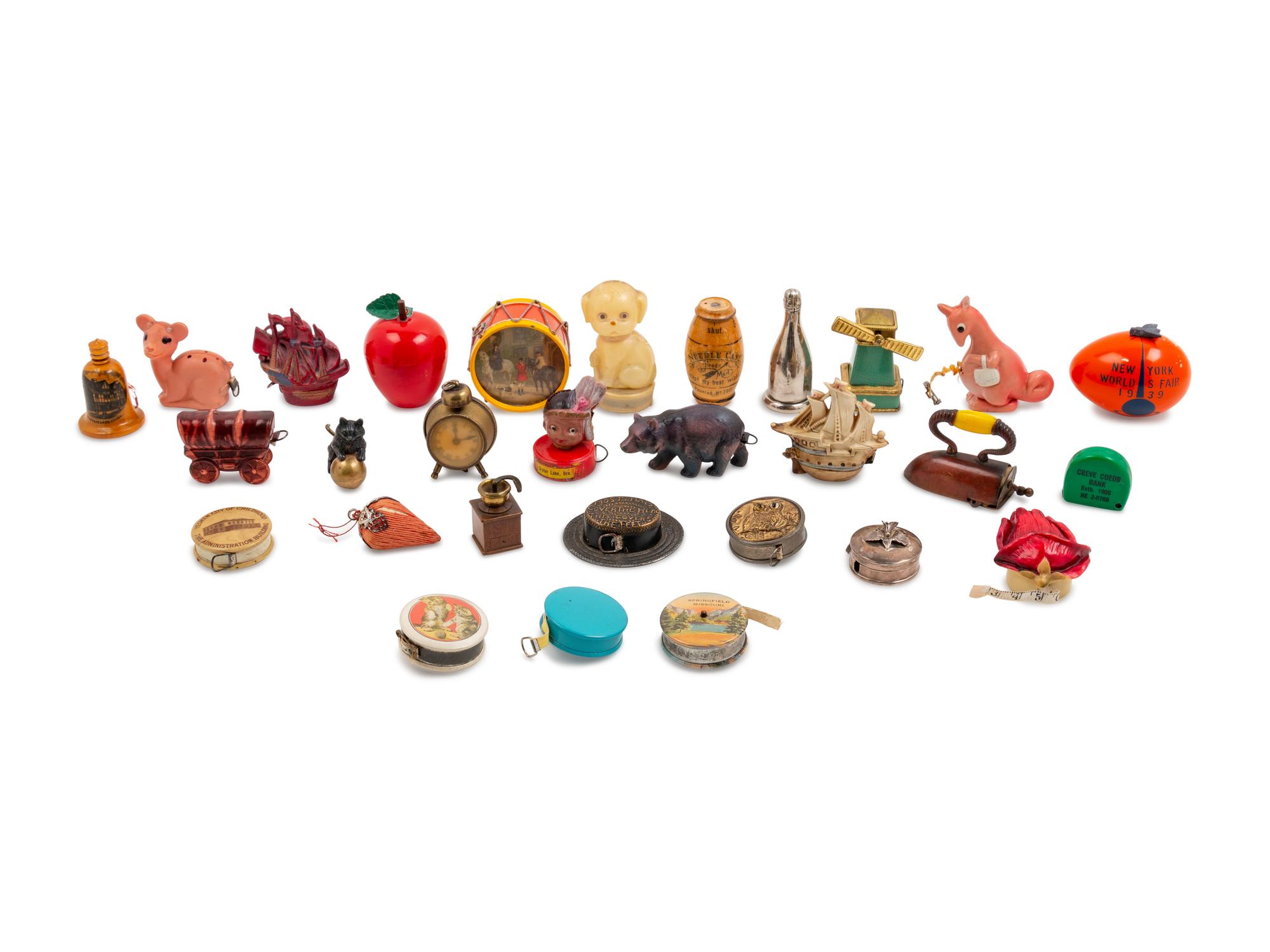 A Collection of Twenty-Nine Antique and Vintage Tape Measures