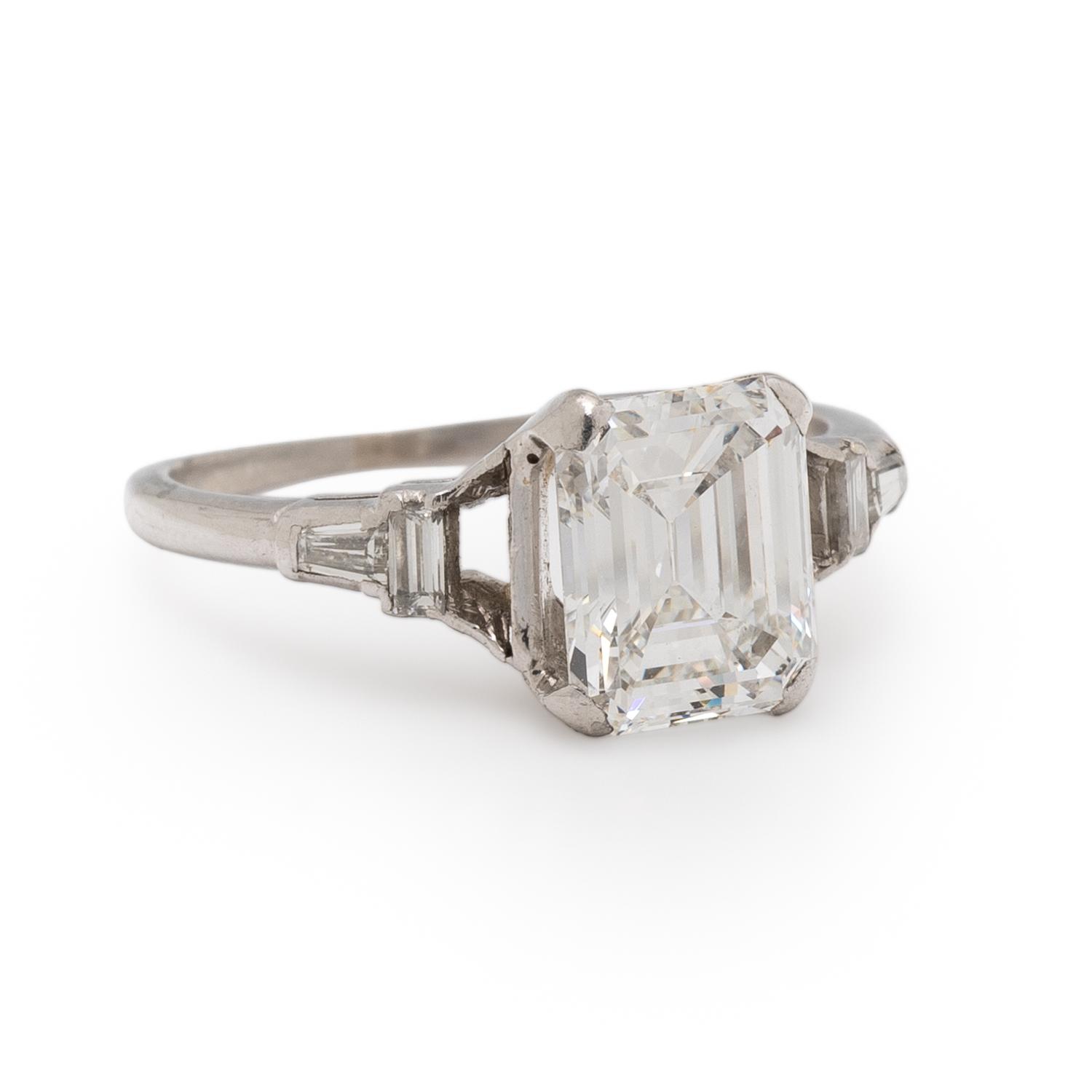 EMERALD CUT DIAMOND AND PLATINUM RING