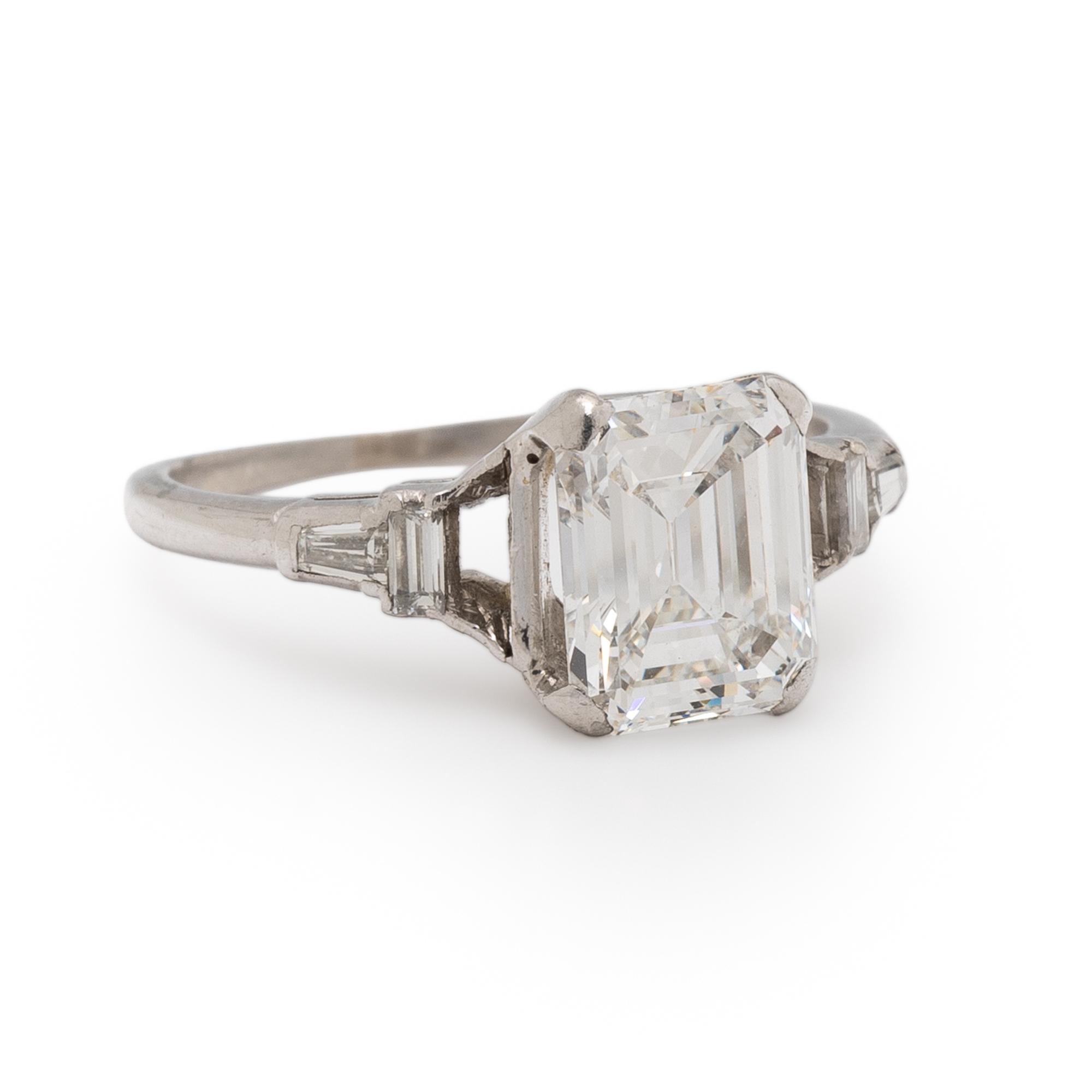 EMERALD CUT DIAMOND AND PLATINUM RING