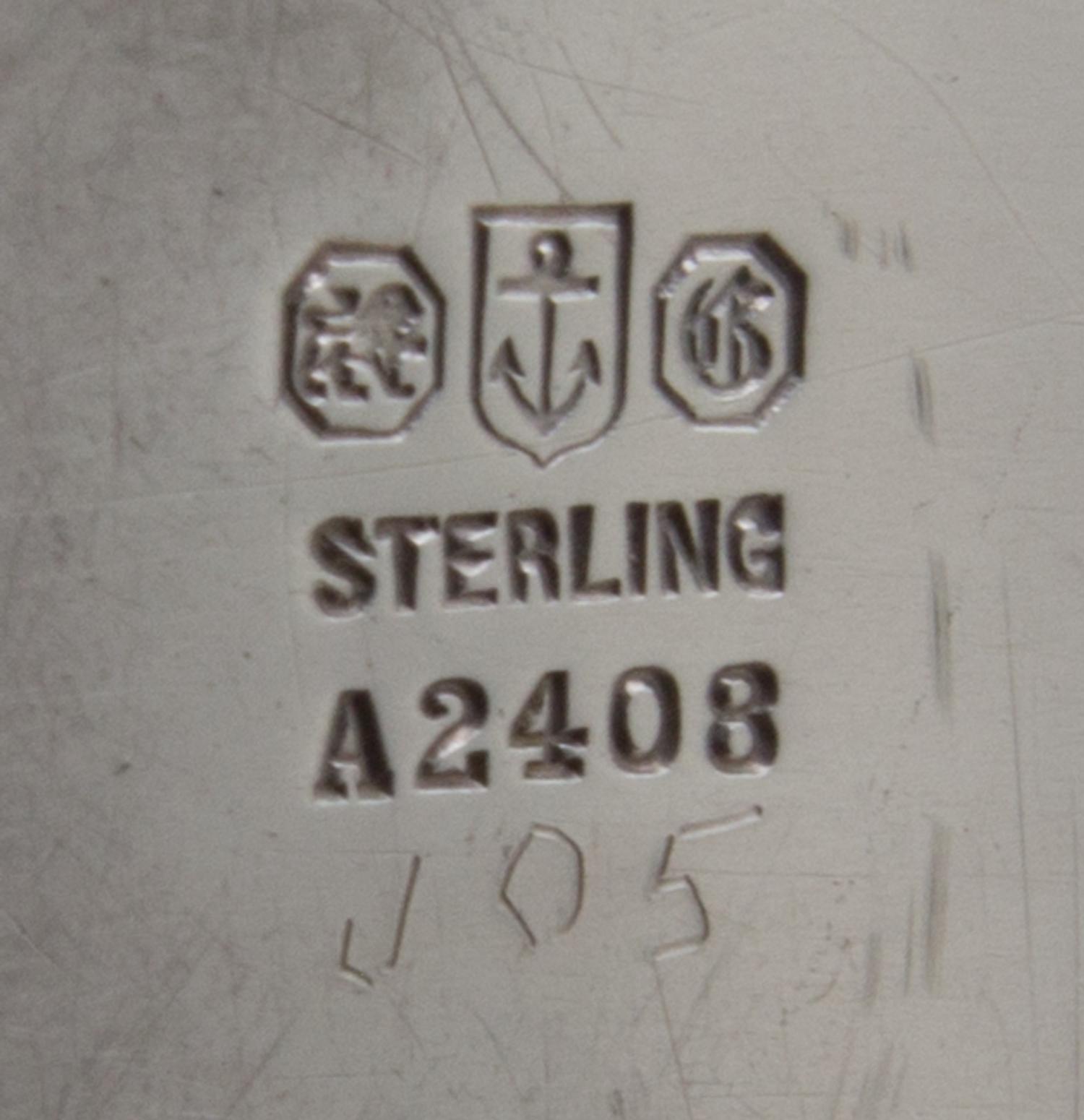 An American Silver Tray, Gorham Mfg. Co., Providence, RI, the rim worked with floral and vine decoration.