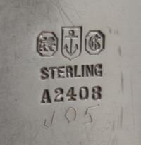 An American Silver Tray, Gorham Mfg. Co., Providence, RI, the rim worked with floral and vine decoration.