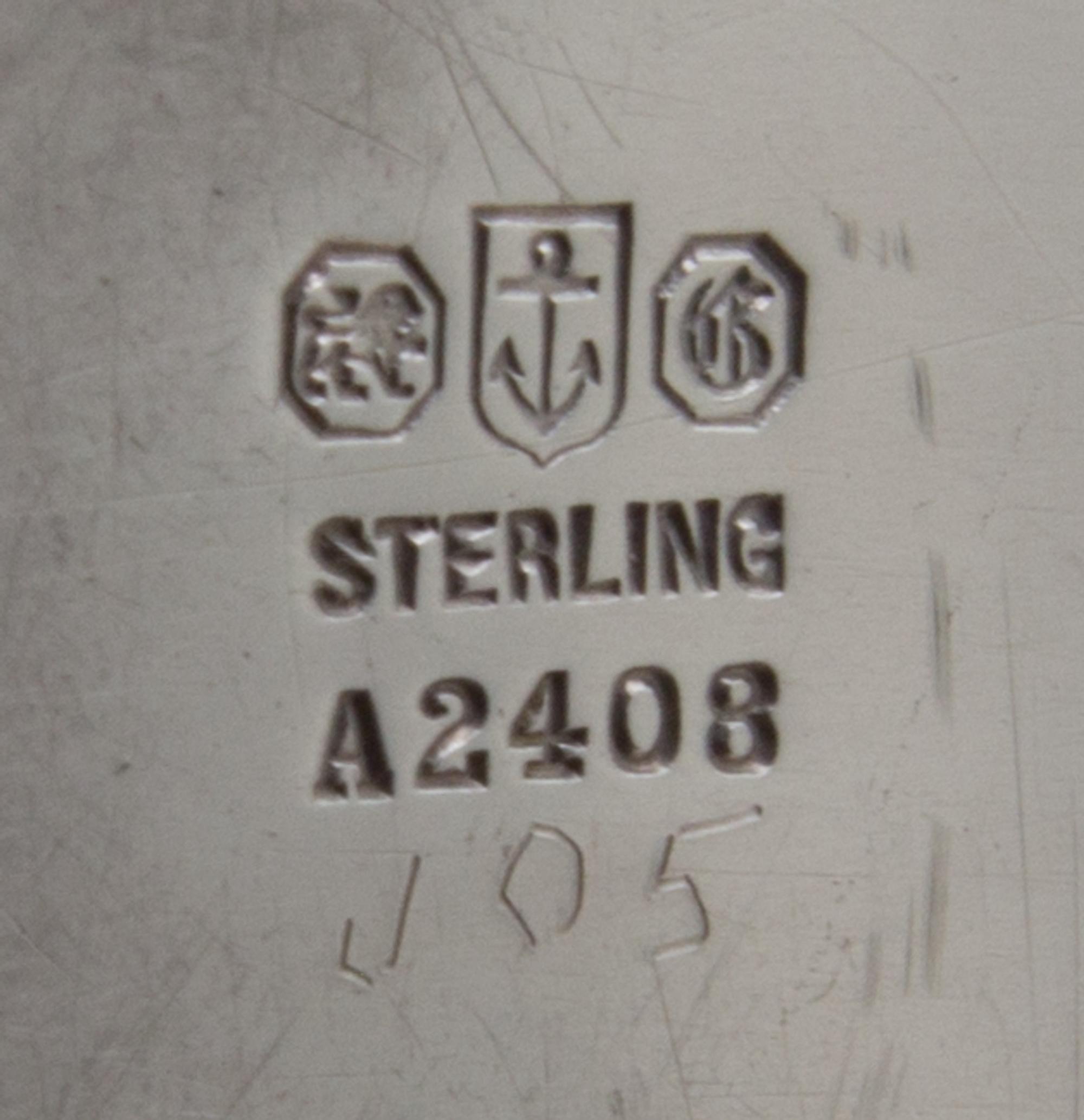 An American Silver Tray, Gorham Mfg. Co., Providence, RI, the rim worked with floral and vine decoration.