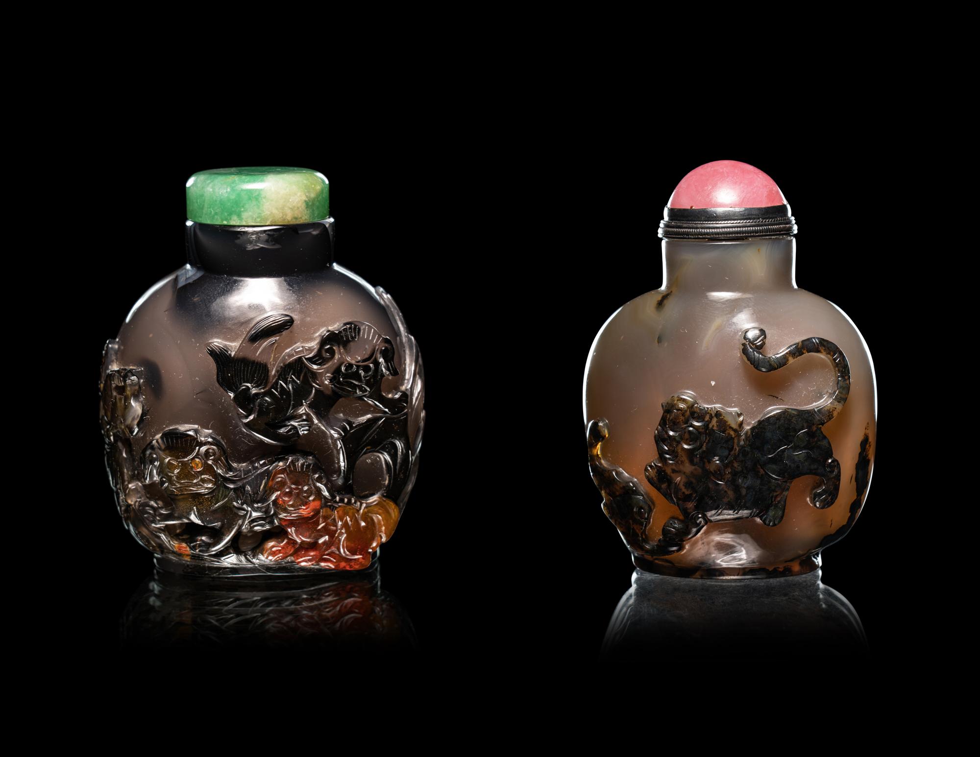 Two Carved Agate 'Fu Lion' Snuff Bottles