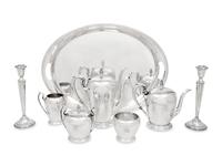 An American Silver Five-Piece Tea and Coffee Service and a Pair of Cartier Silver Candlesticks