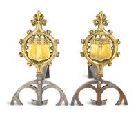 A Pair of Gothic Style Brass and Steel Andirons