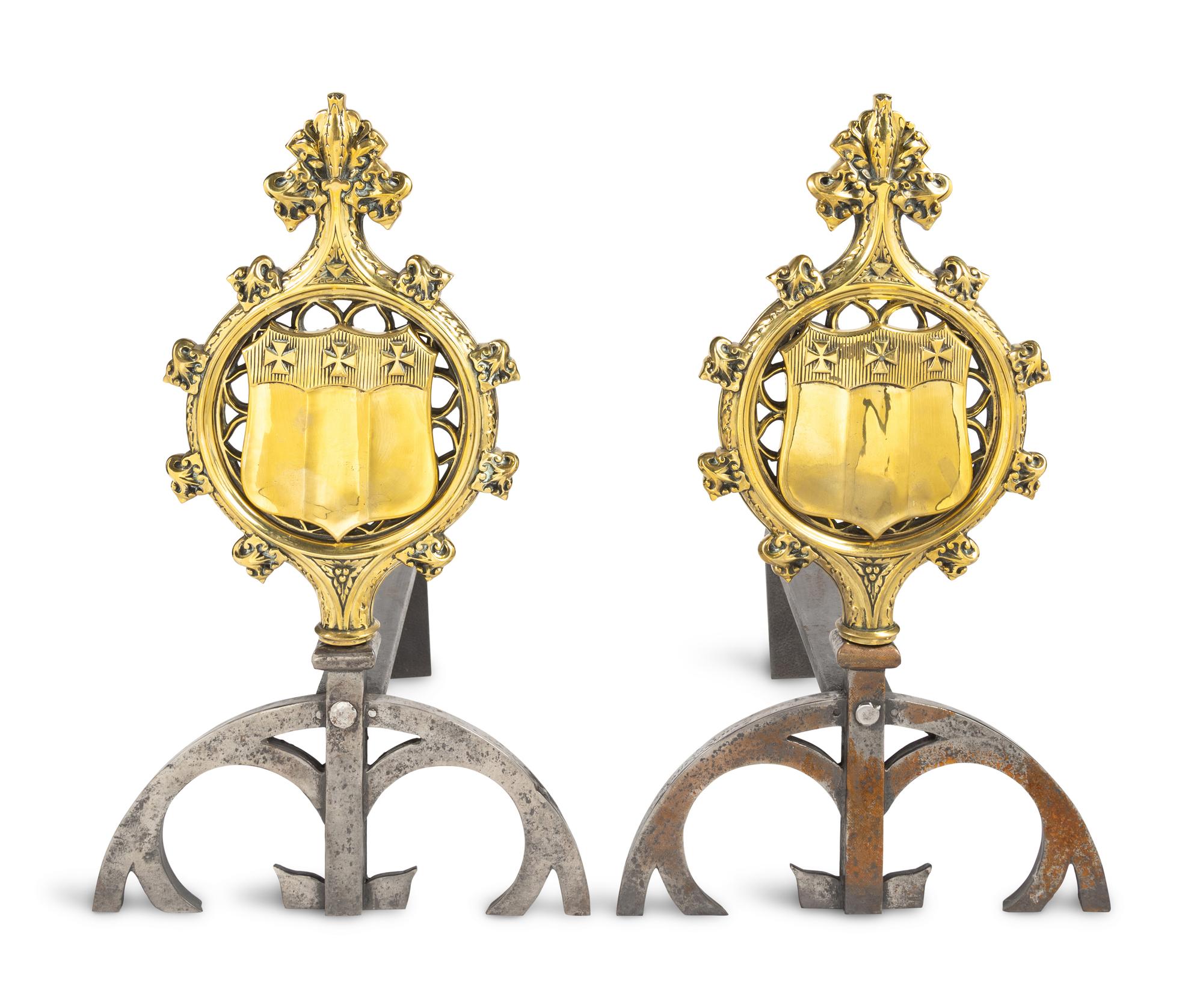 A Pair of Gothic Style Brass and Steel Andirons