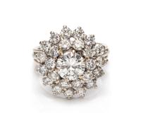 An 18 Karat White Gold and Diamond Cluster Ring,